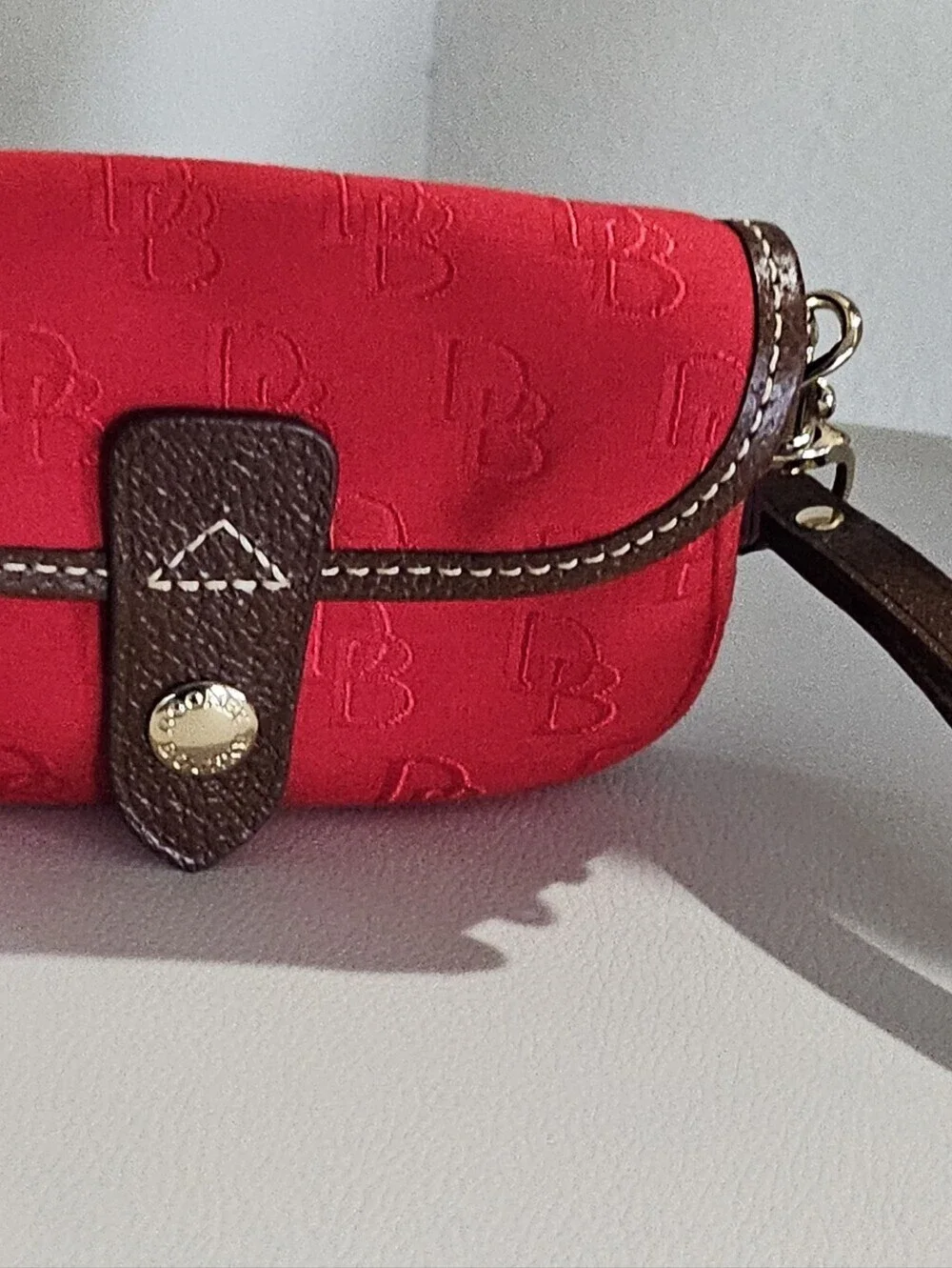Dooney & Bourke Red Monogram Wristlet Pouch Brown Trim Smal Clutch Wallet.